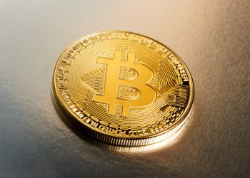 Bitcoin on a plain background. Markets: Bitcoin, Ether, Cardano, XRP fall; BNB gains on Binance Twitter investment